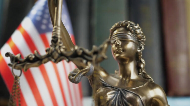 Lady justice holding a balance.